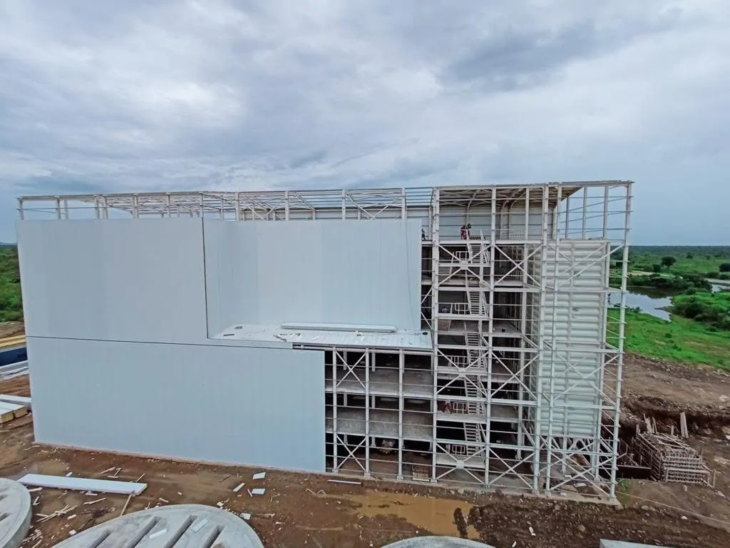 Clad steel mill building