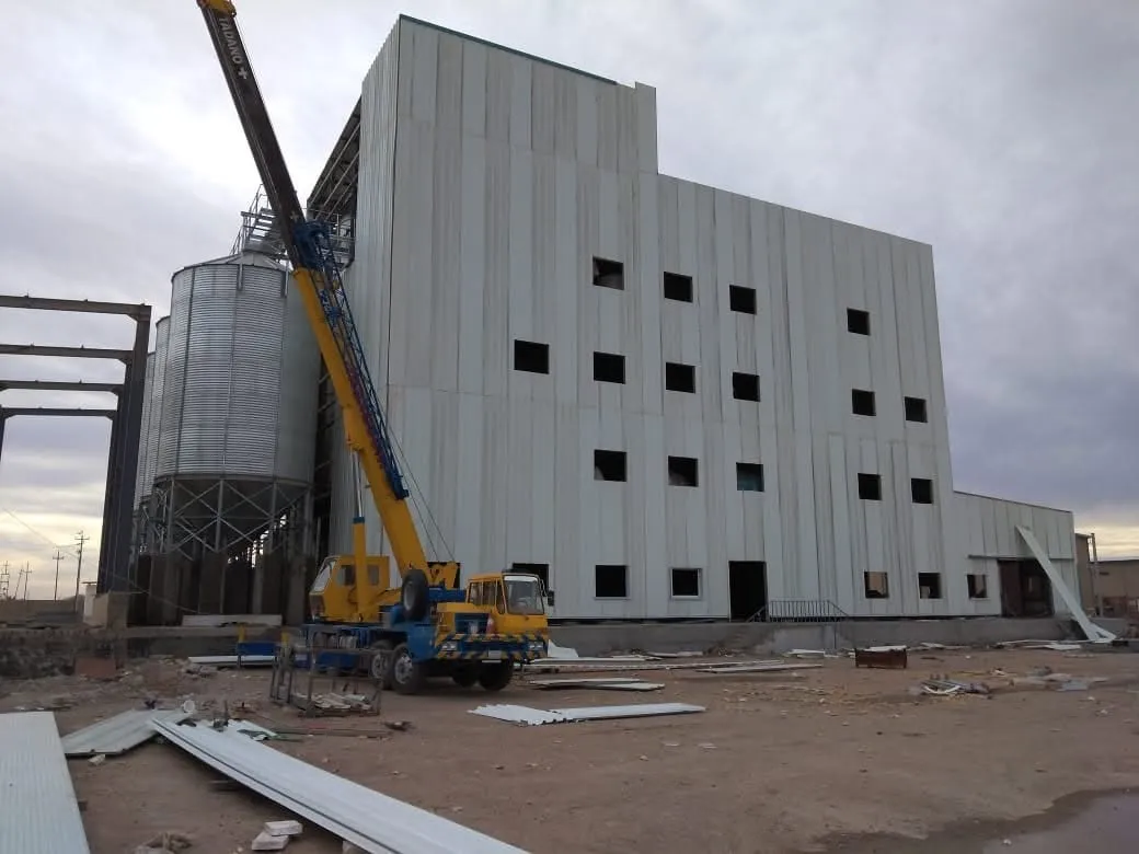Clad steel mill building