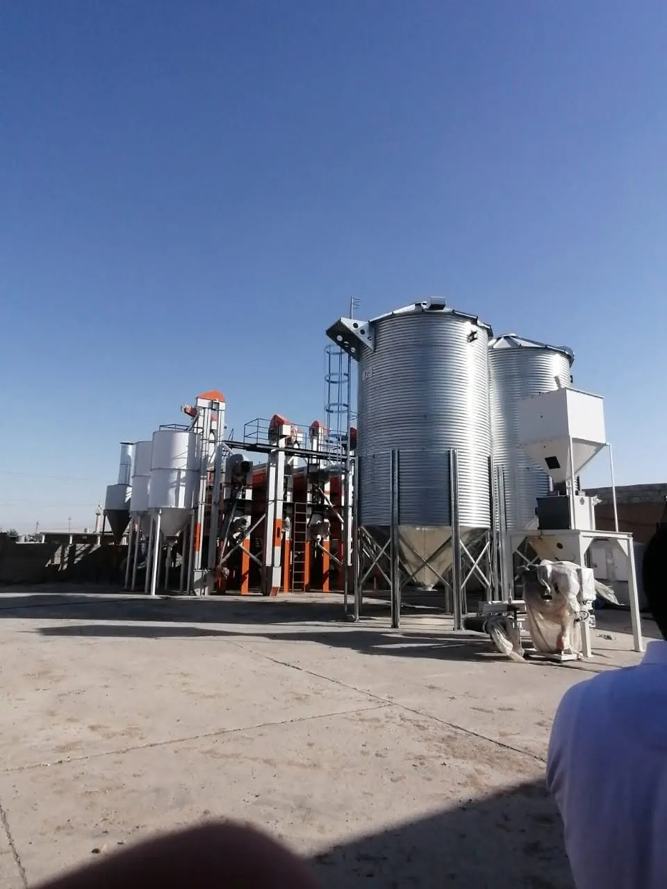 Silos alongside the plant structure